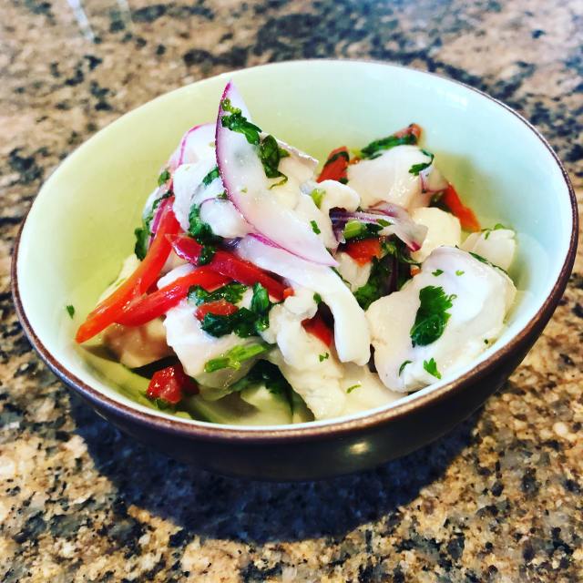 ceviche in a bowl before the melon