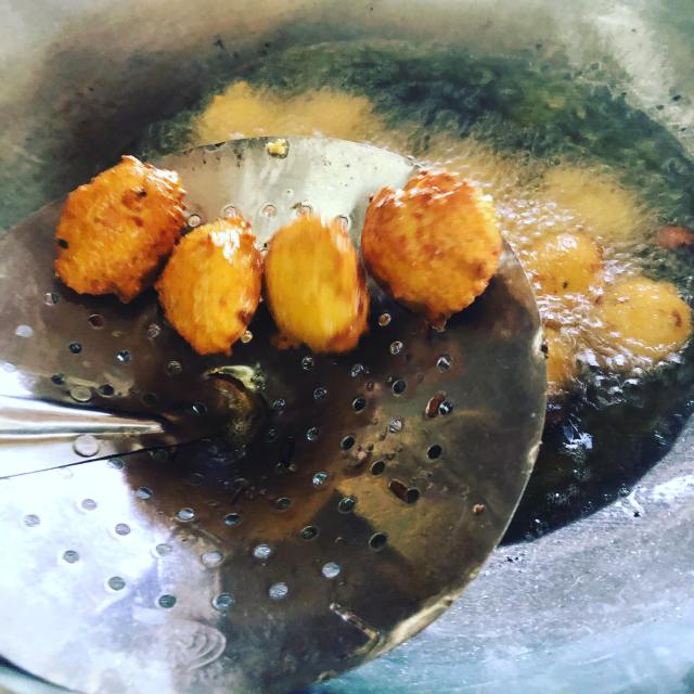 corn fritters frying